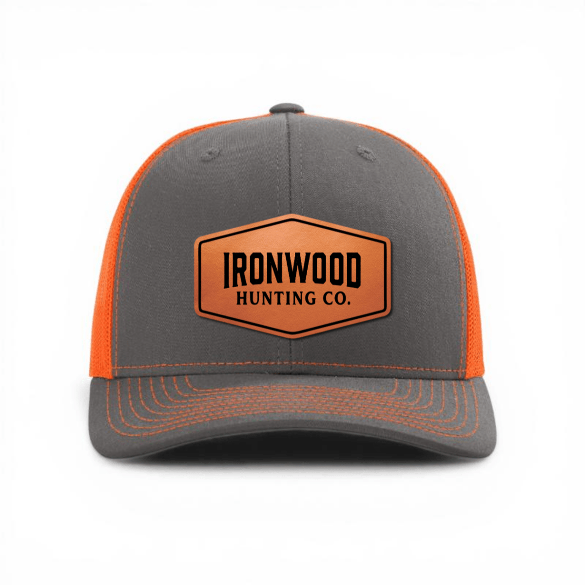 Gray and orange cap with a leather patch on a white background